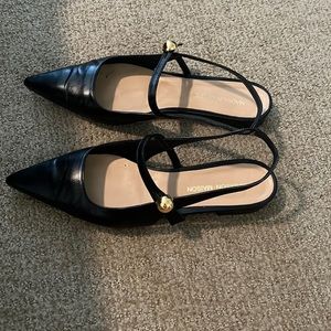 Leather flats with gold button accent